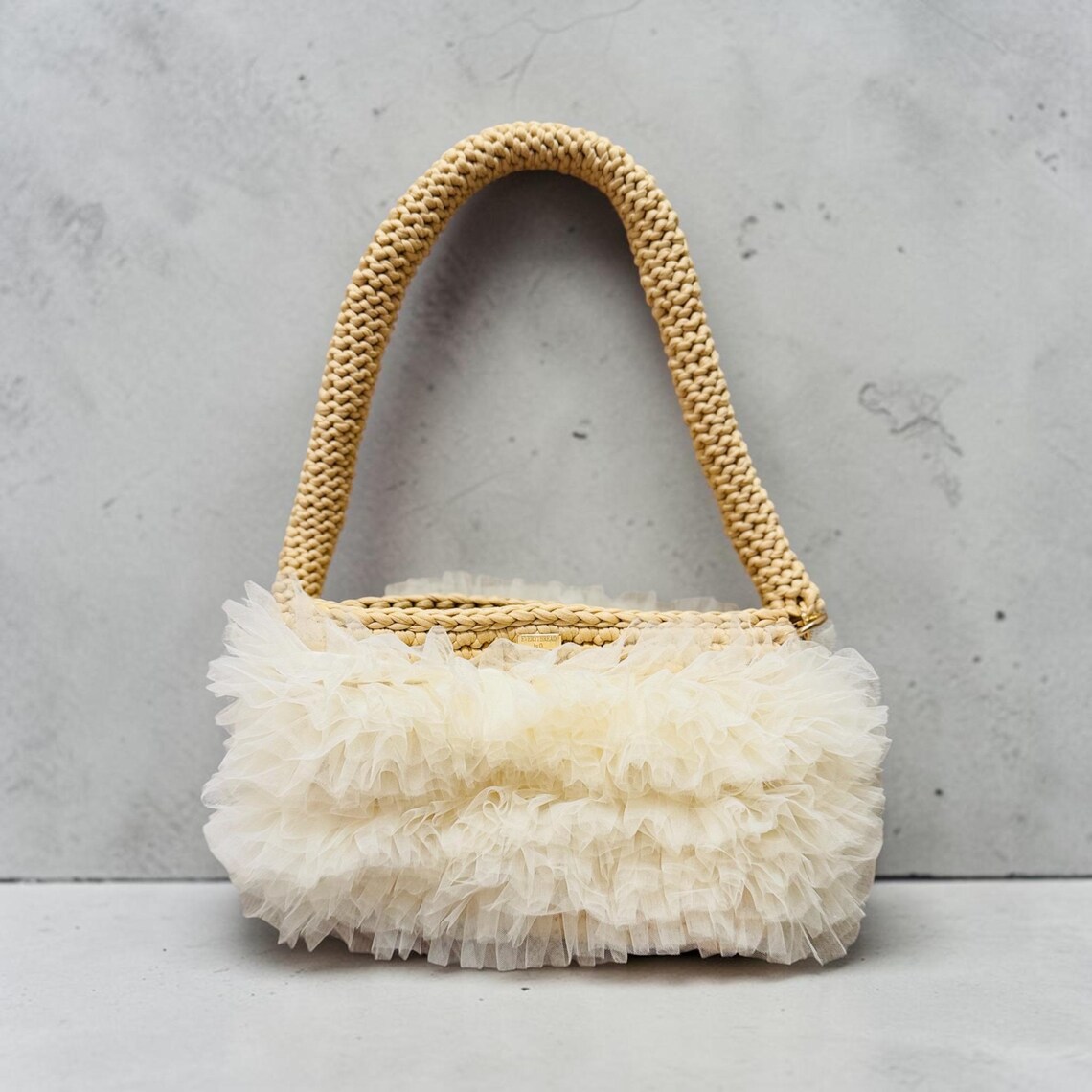 Handmade beige crochet shoulder bag with organza ruffle detail