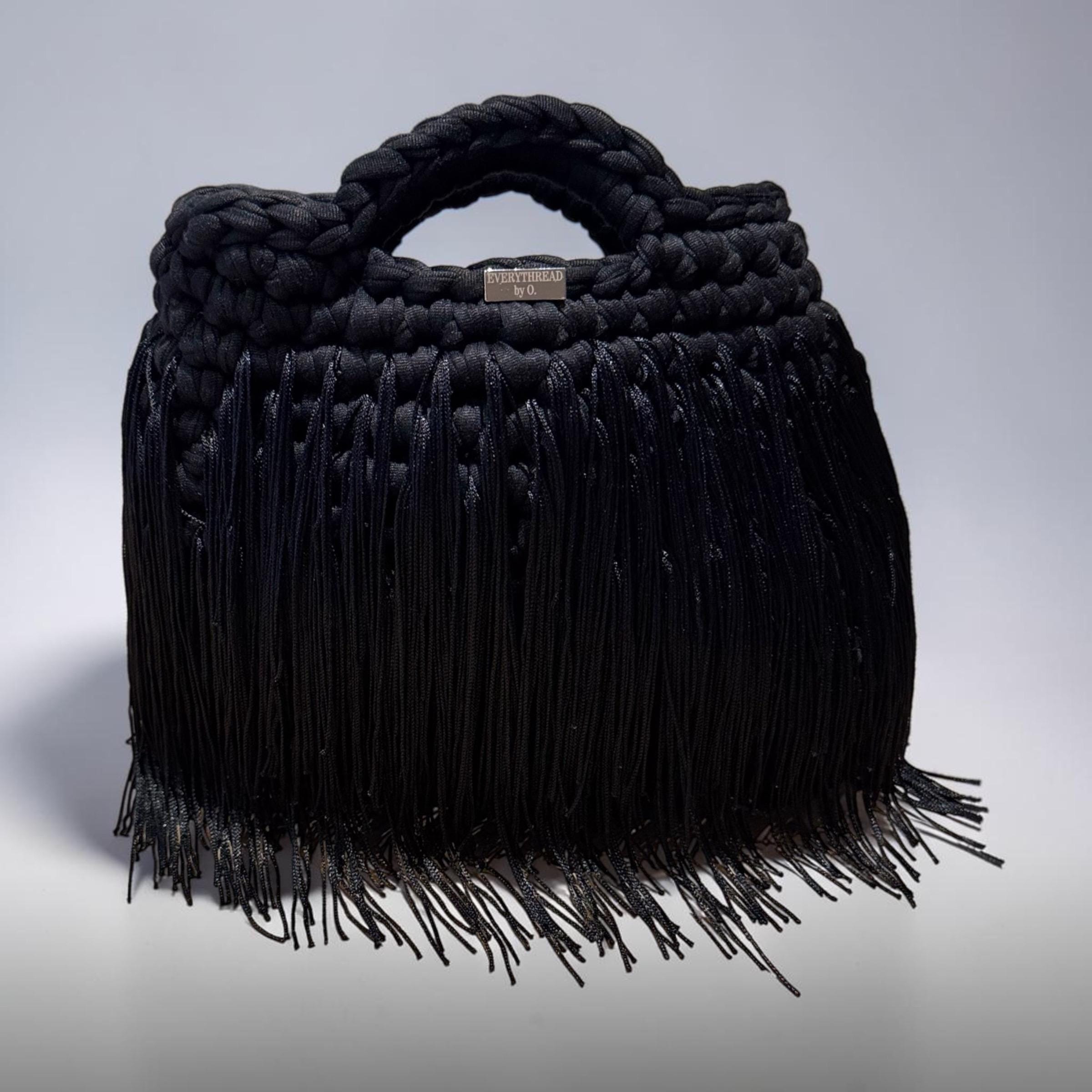 Black chunky crochet handbag with long flowing black fringe