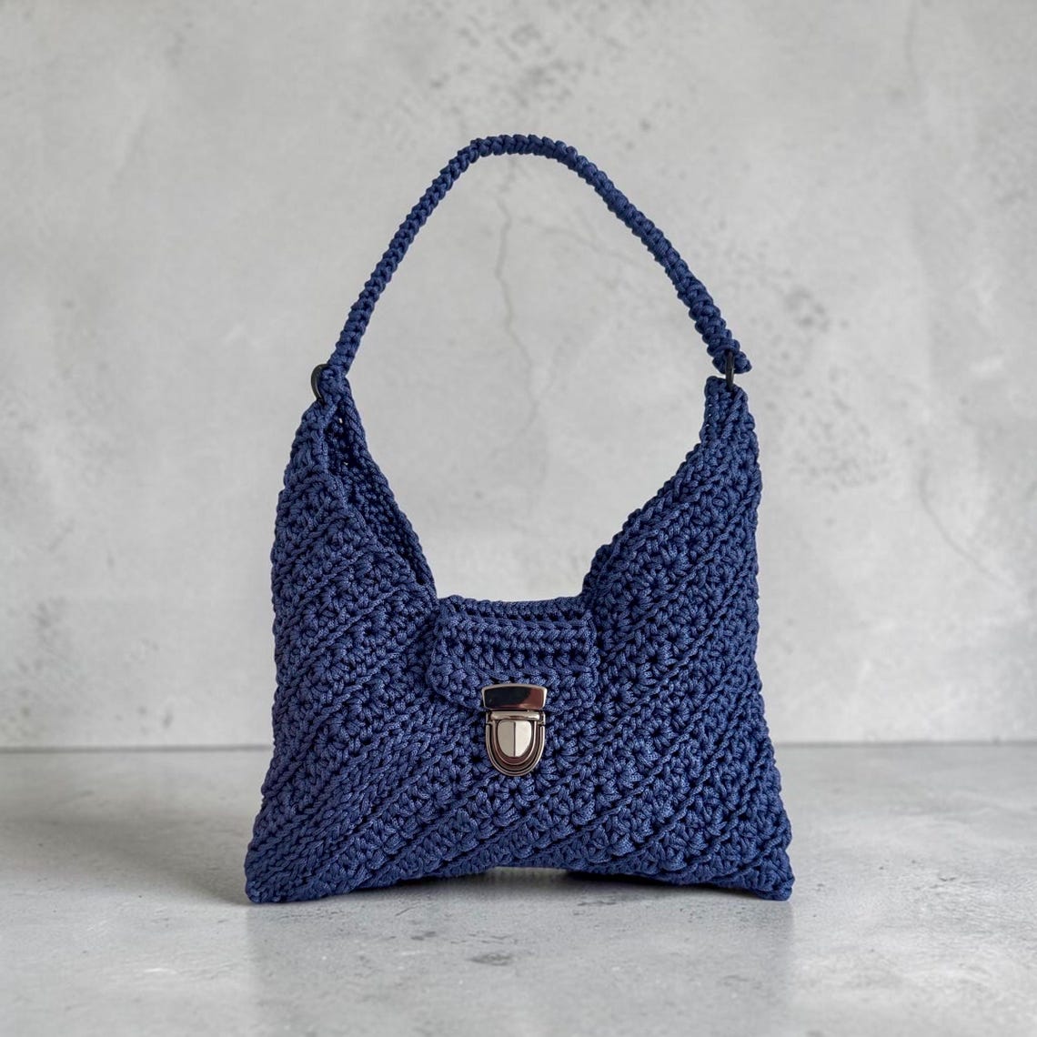 Handmade blue textured crochet shoulder bag with silver clasp