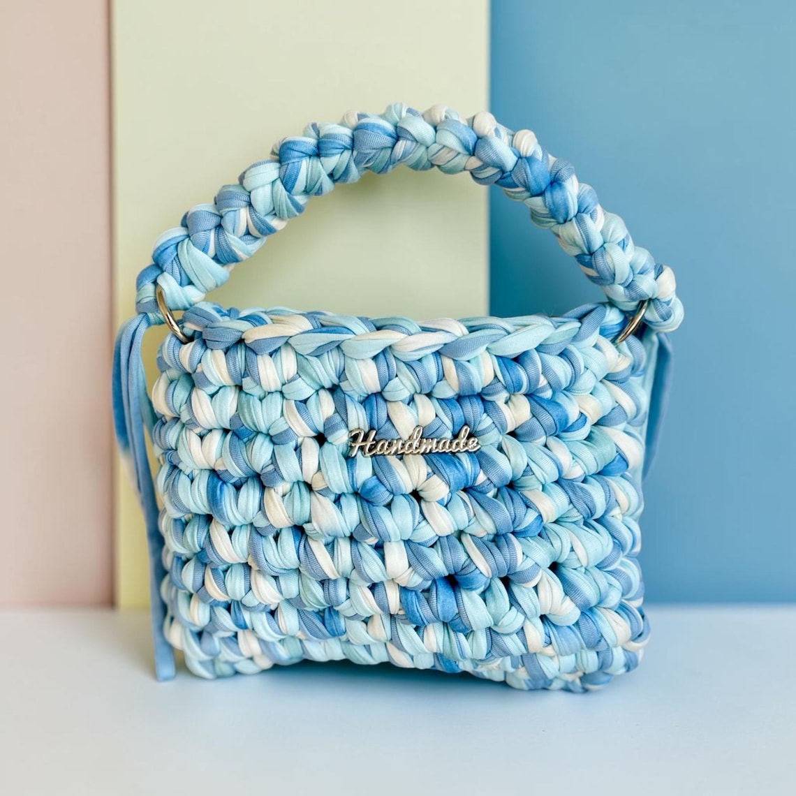 Handmade blue and white crochet purse
