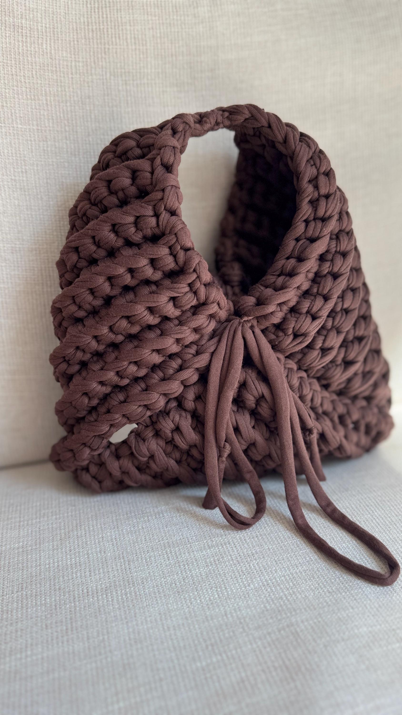 Brown Triangular Handbag with Iced Coffee Charm, texture detail