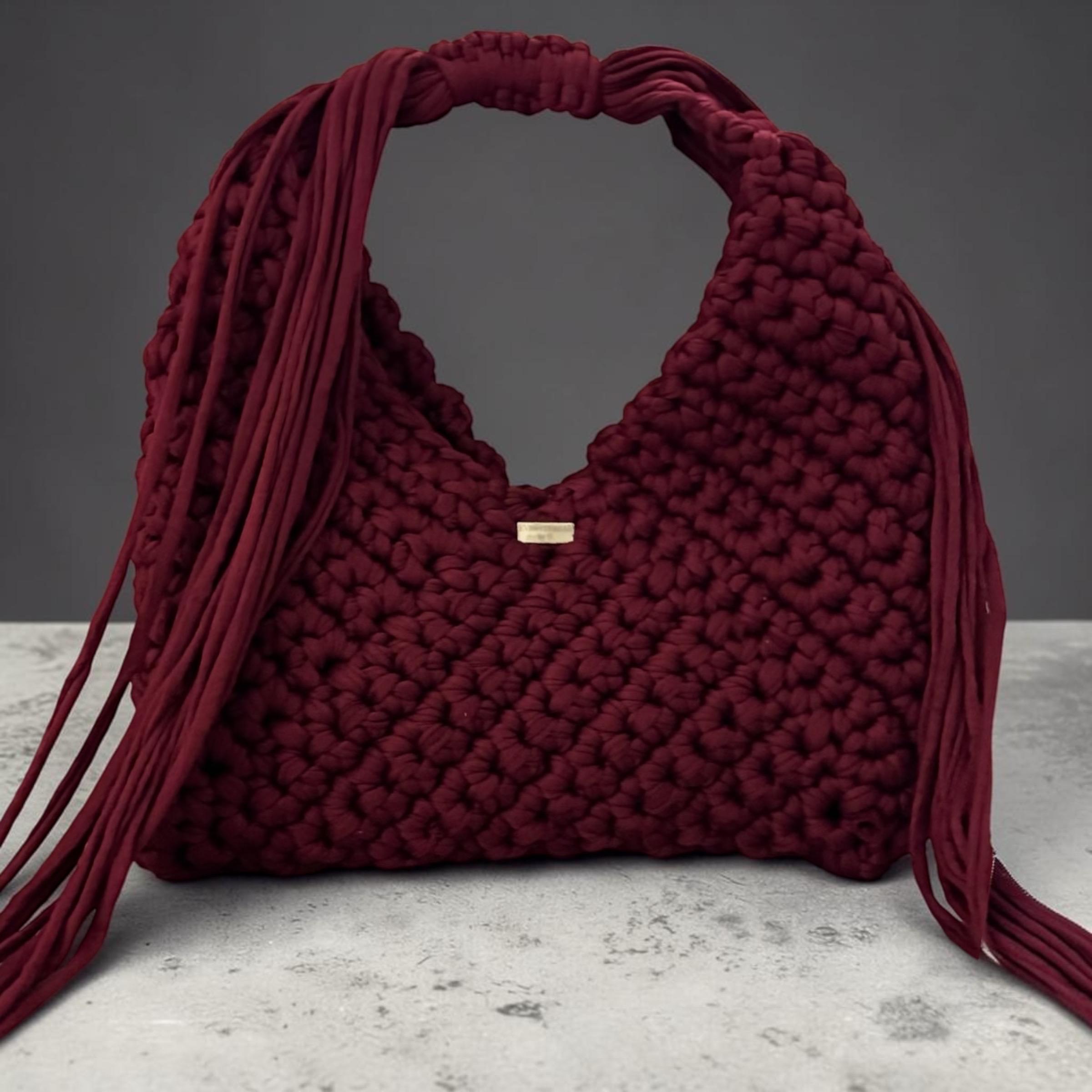 Burgundy Adjustable Triangle Bag, worn as shoulder bag