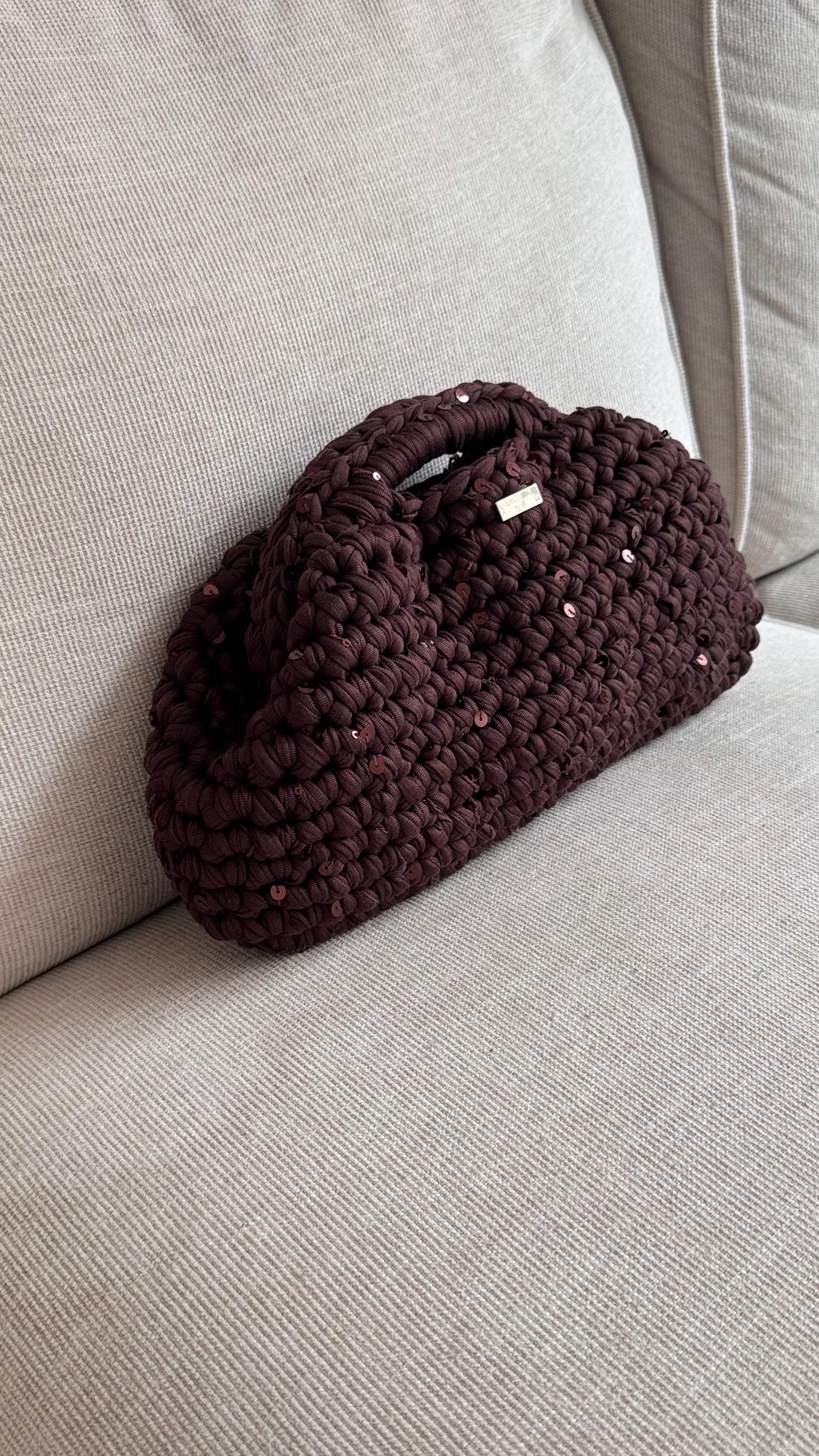 Chocolate brown sequin clutch, detail view of fermoir clasp