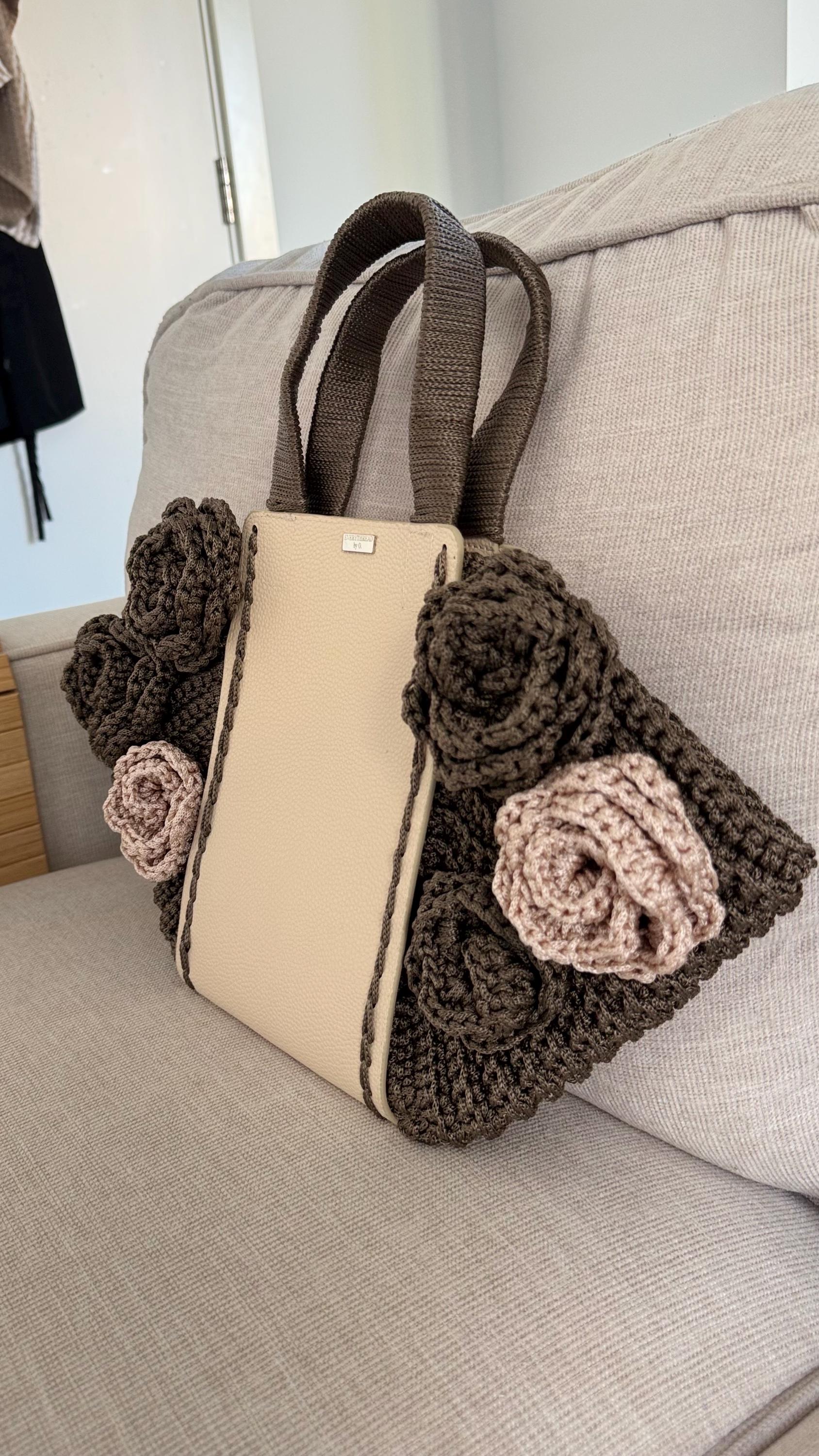 Chocolate and cream crochet flower tote bag, styled view