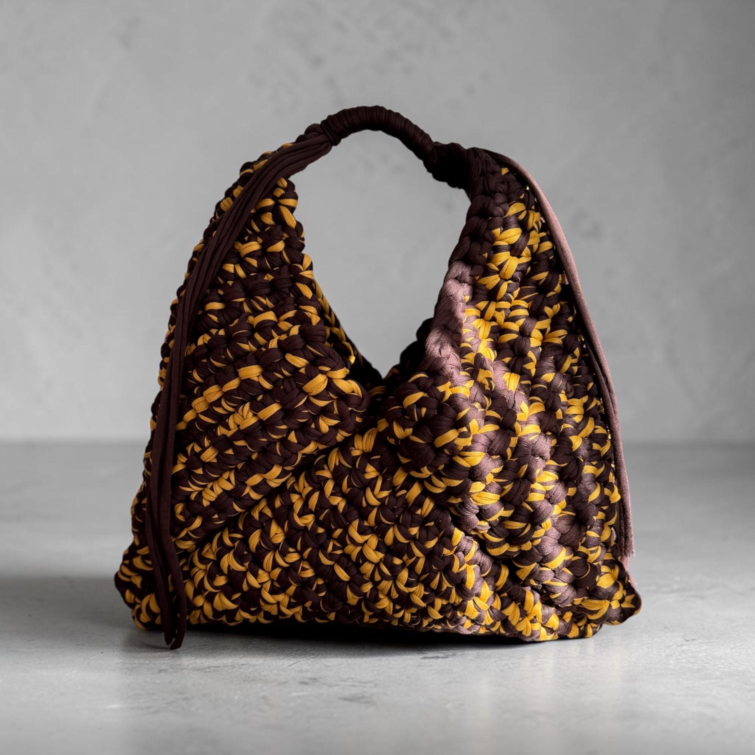 Chocolate brown and mustard crochet triangle bag with wrapped handle and tassels