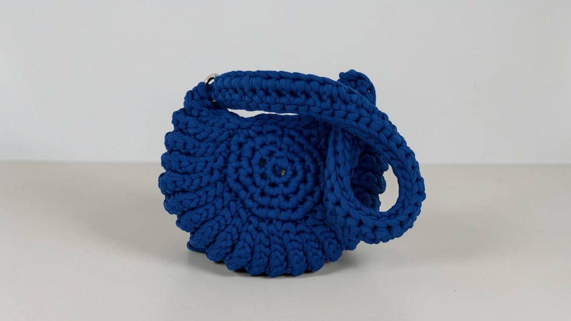 Cobalt blue crochet mini bag with shell motif