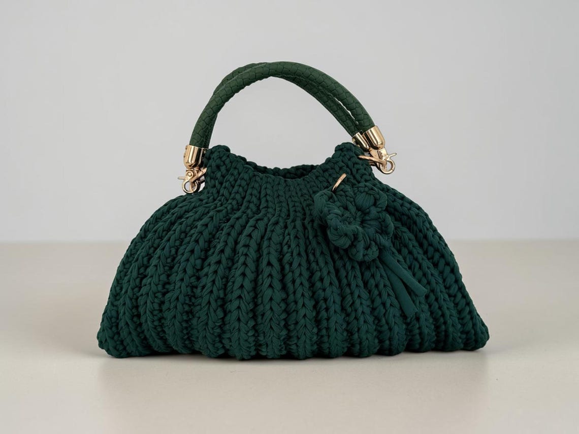 Forest green crochet handbag with removable flower keychain