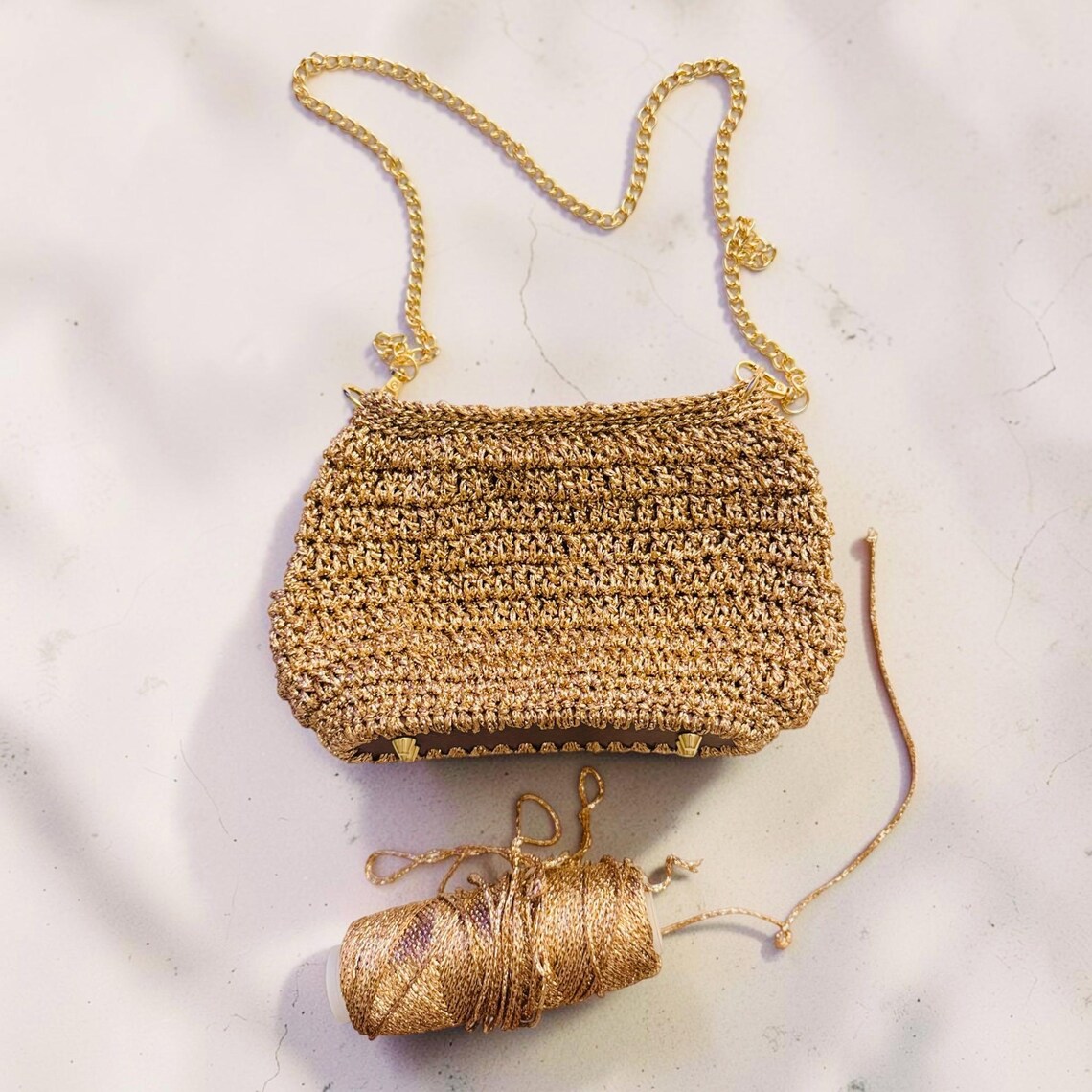 Gold evening bag, side view
