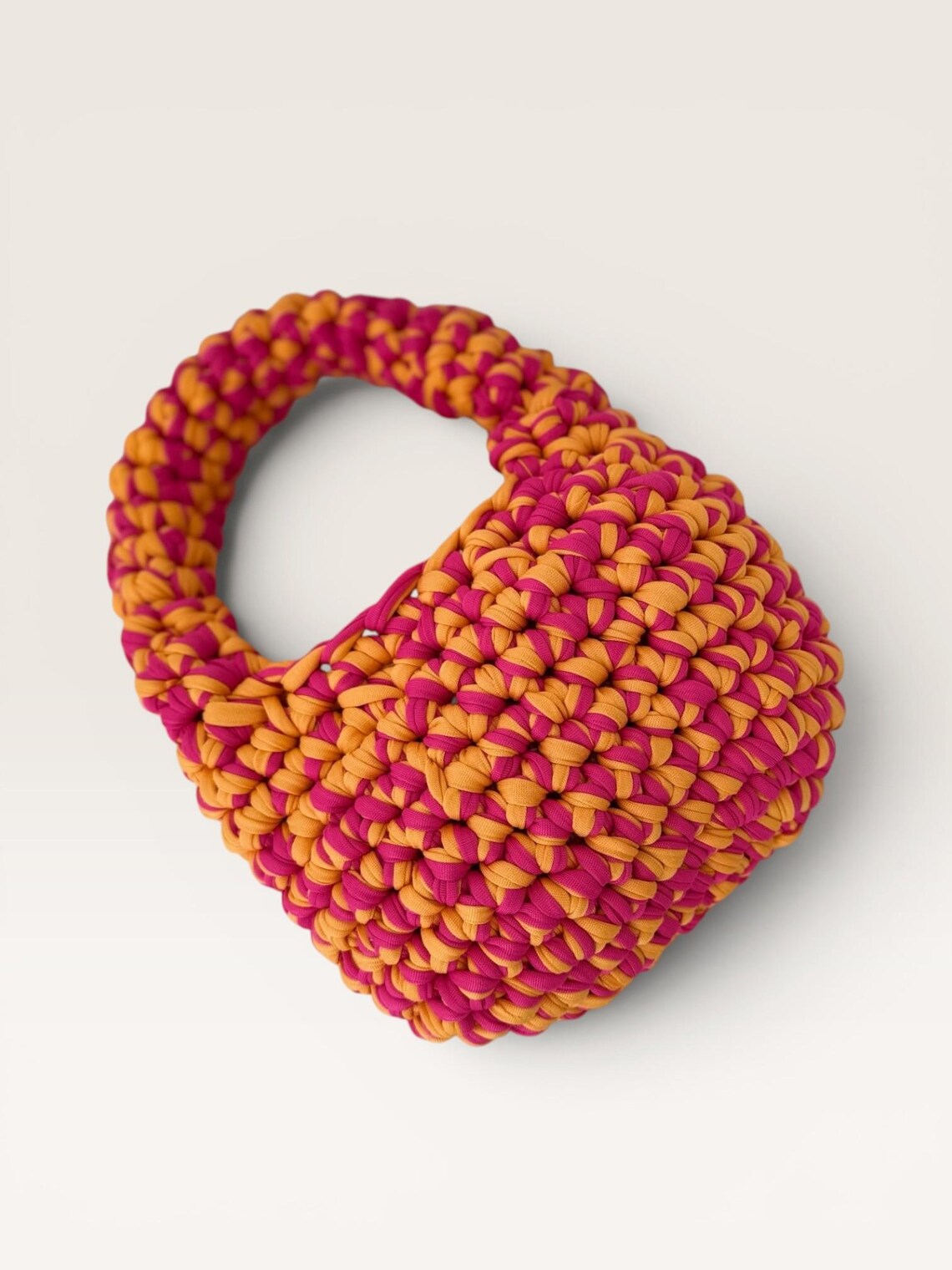 Two-tone hot pink and orange chunky crochet mini bag