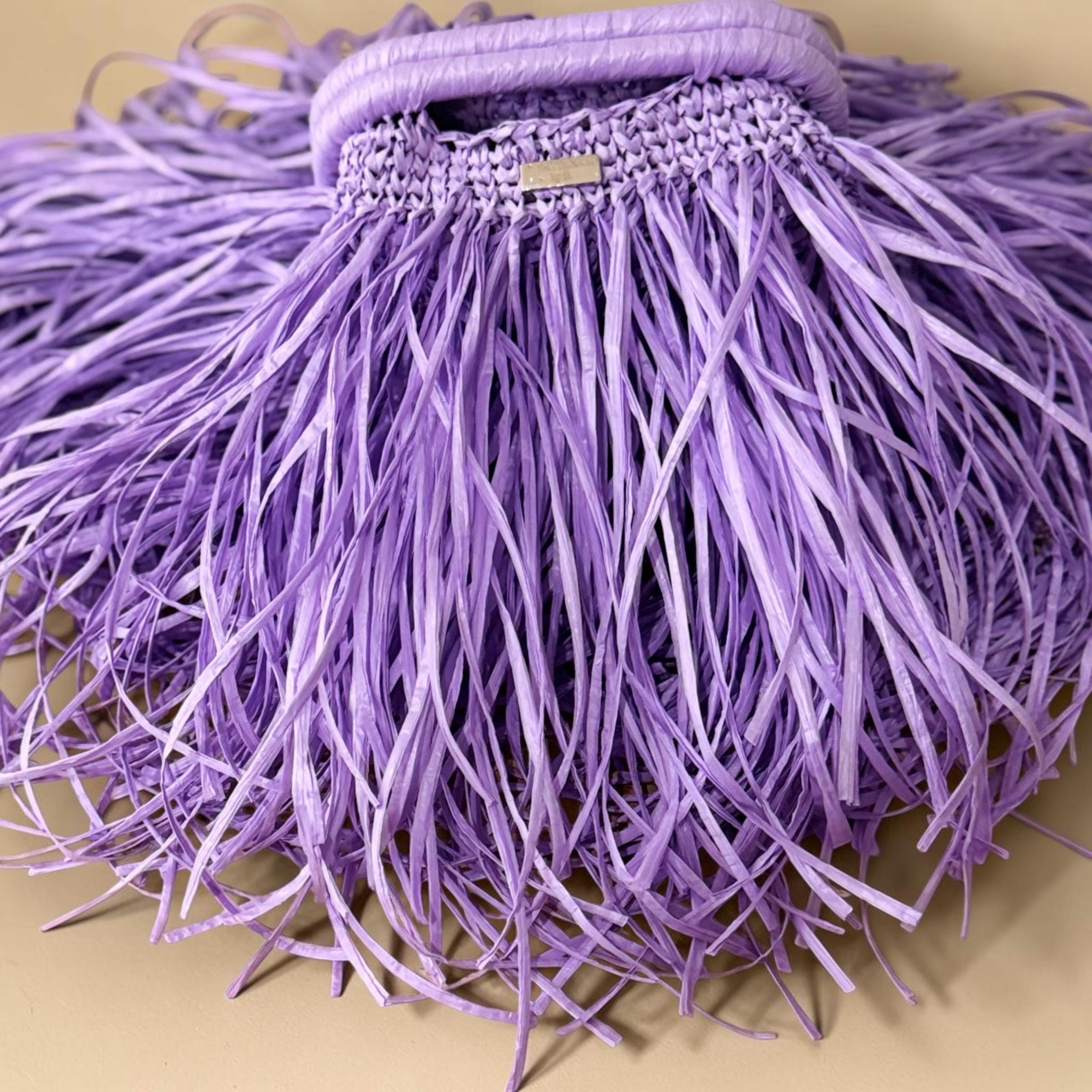 Lavender viscose raffia clutch bag with long fringe