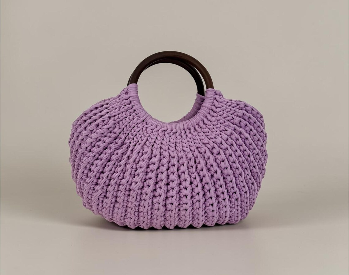 Lavender crochet bag with round dark wooden handle