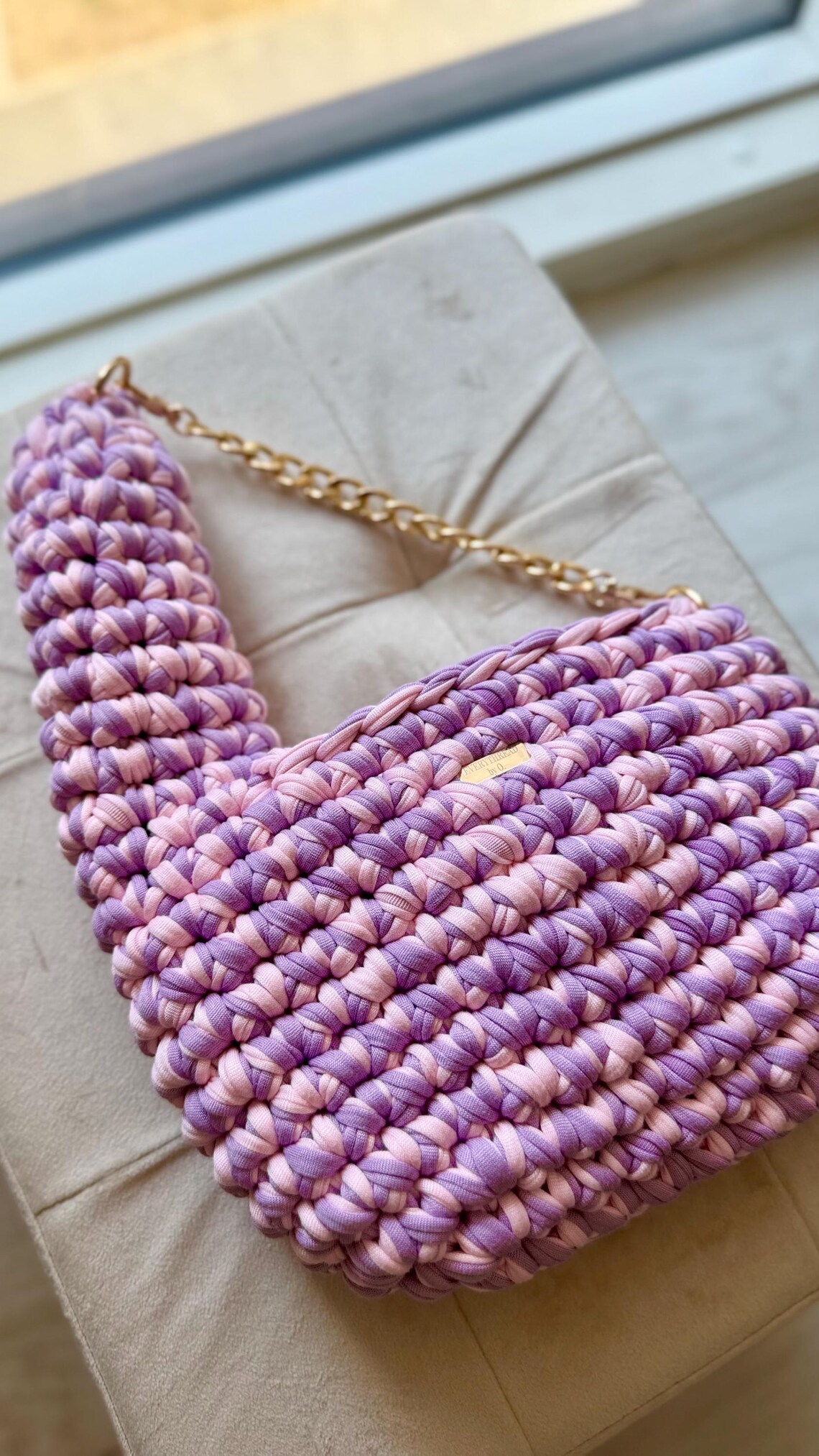 Lilac and blush shoulder bag, side view