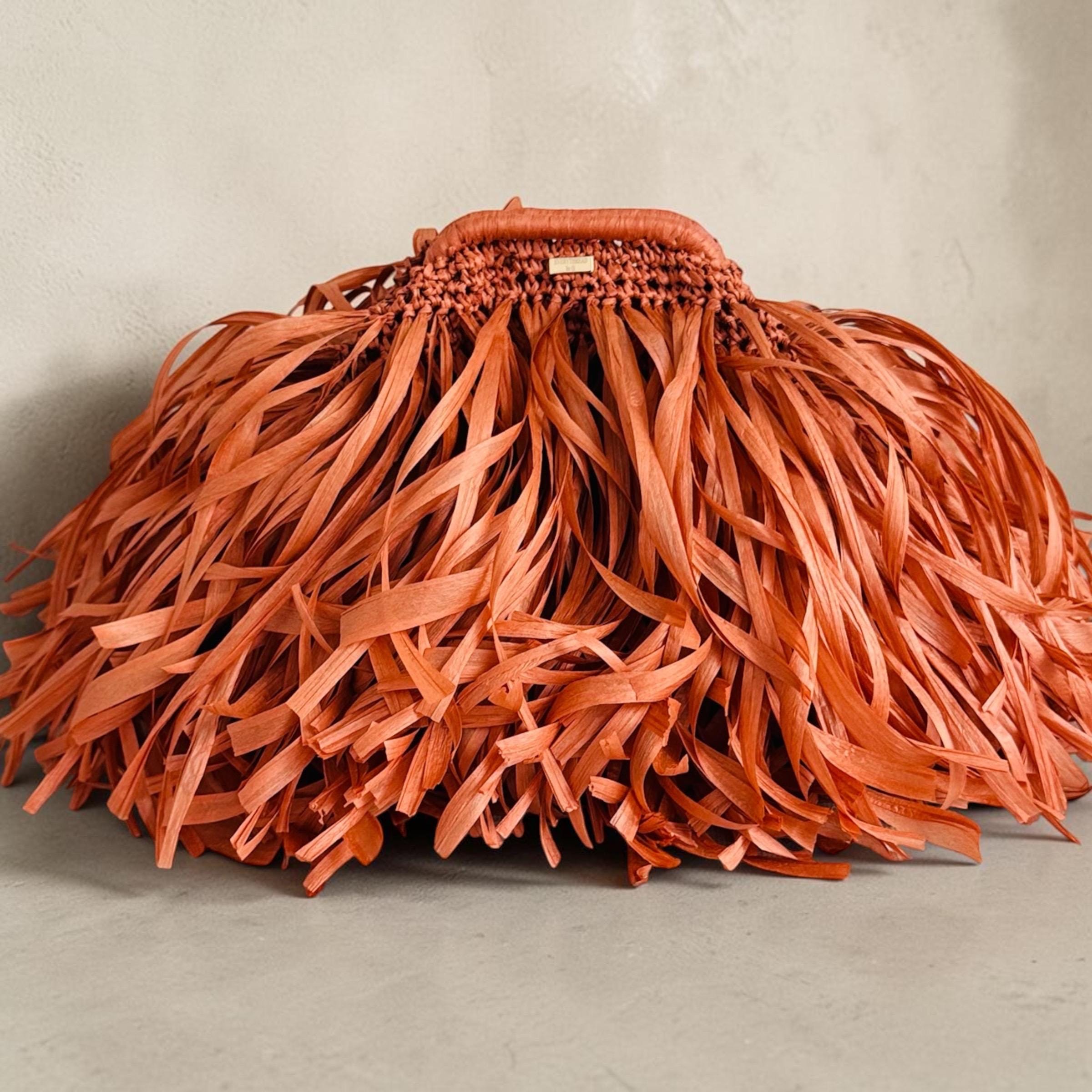 Handmade terracotta raffia handbag, detail view