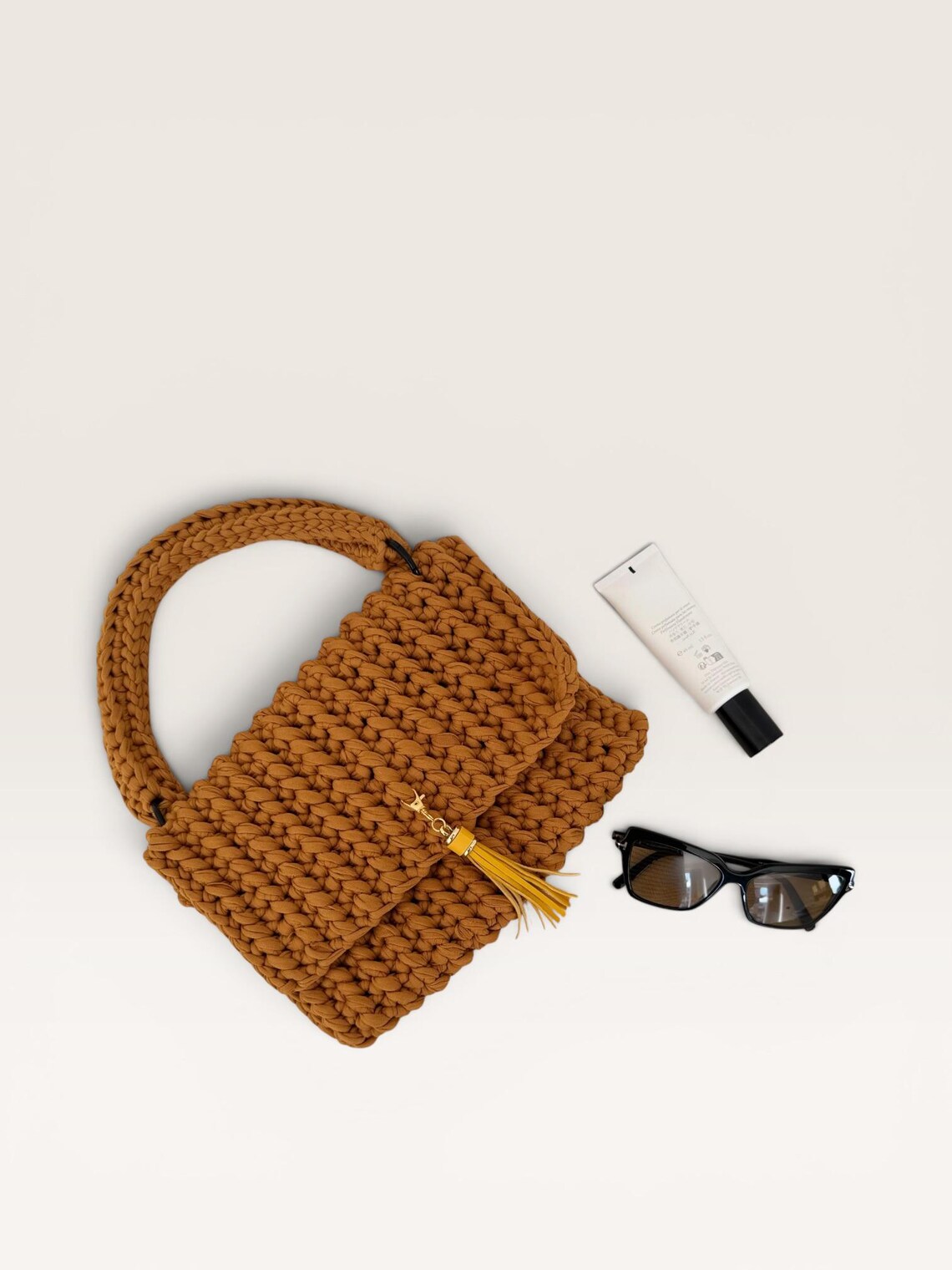 Mustard Tassel Flap Bag, detail view