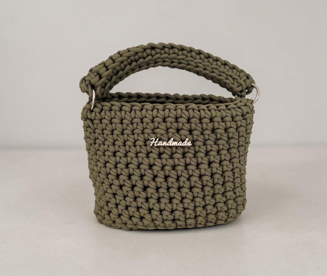 Olive green structured crochet mini bag with silver hardware