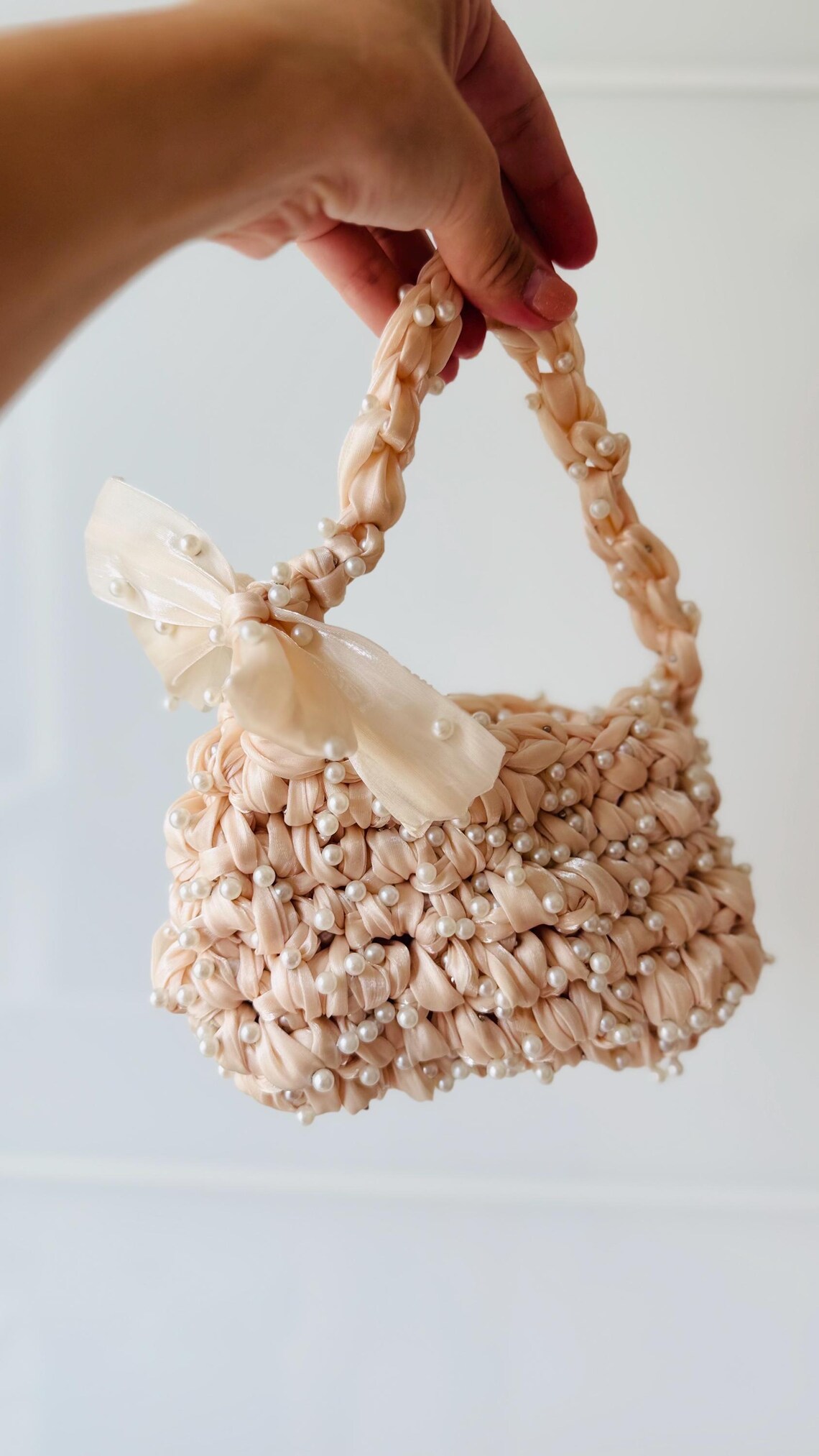 Pearl mini purse, worn view