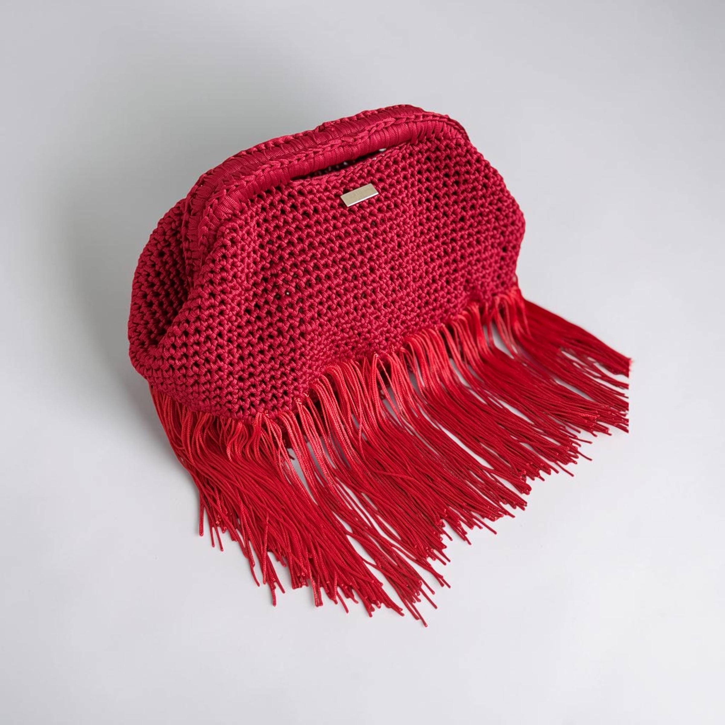 Red crochet clutch bag with flowing fringe
