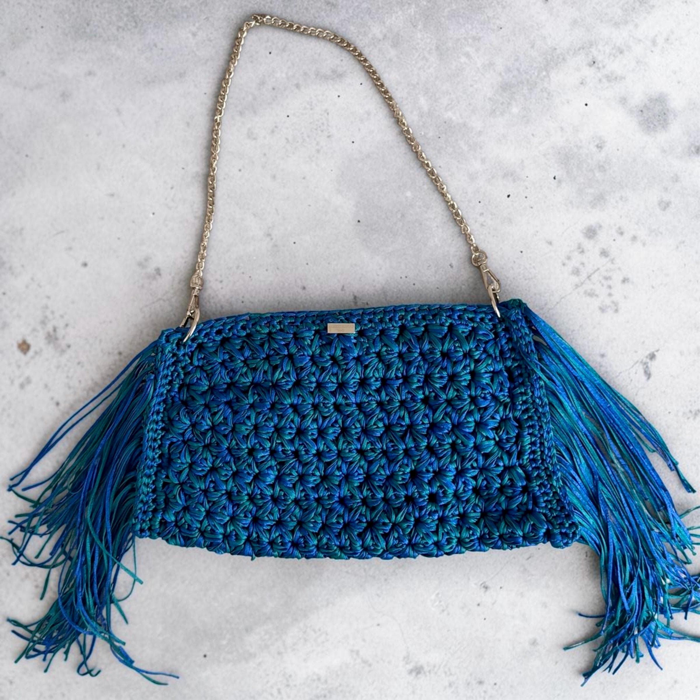 Handmade blue and turquoise crochet shoulder bag with flowing fringe and silver-tone chain strap