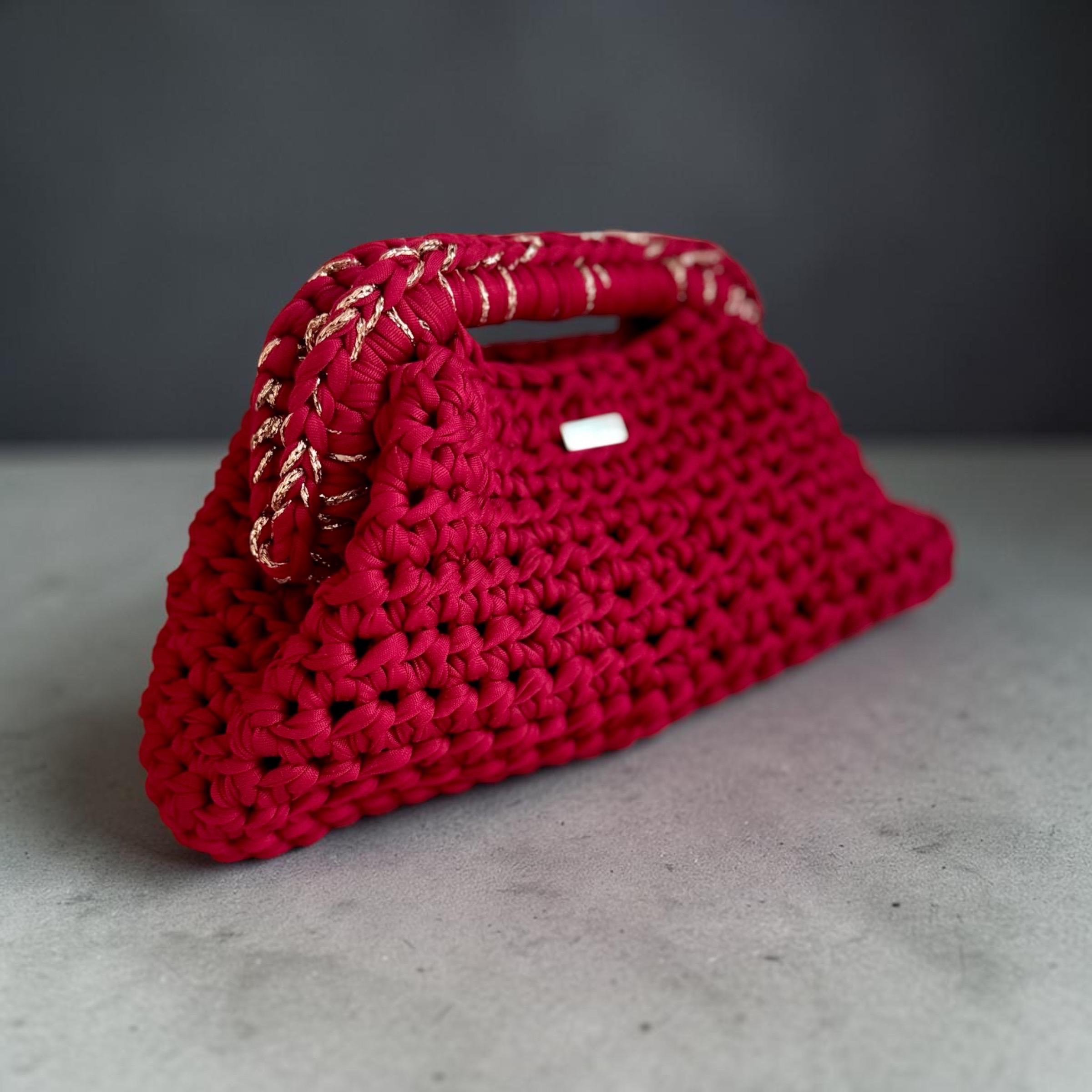 Wine red crochet clutch with fermoir clasp closure