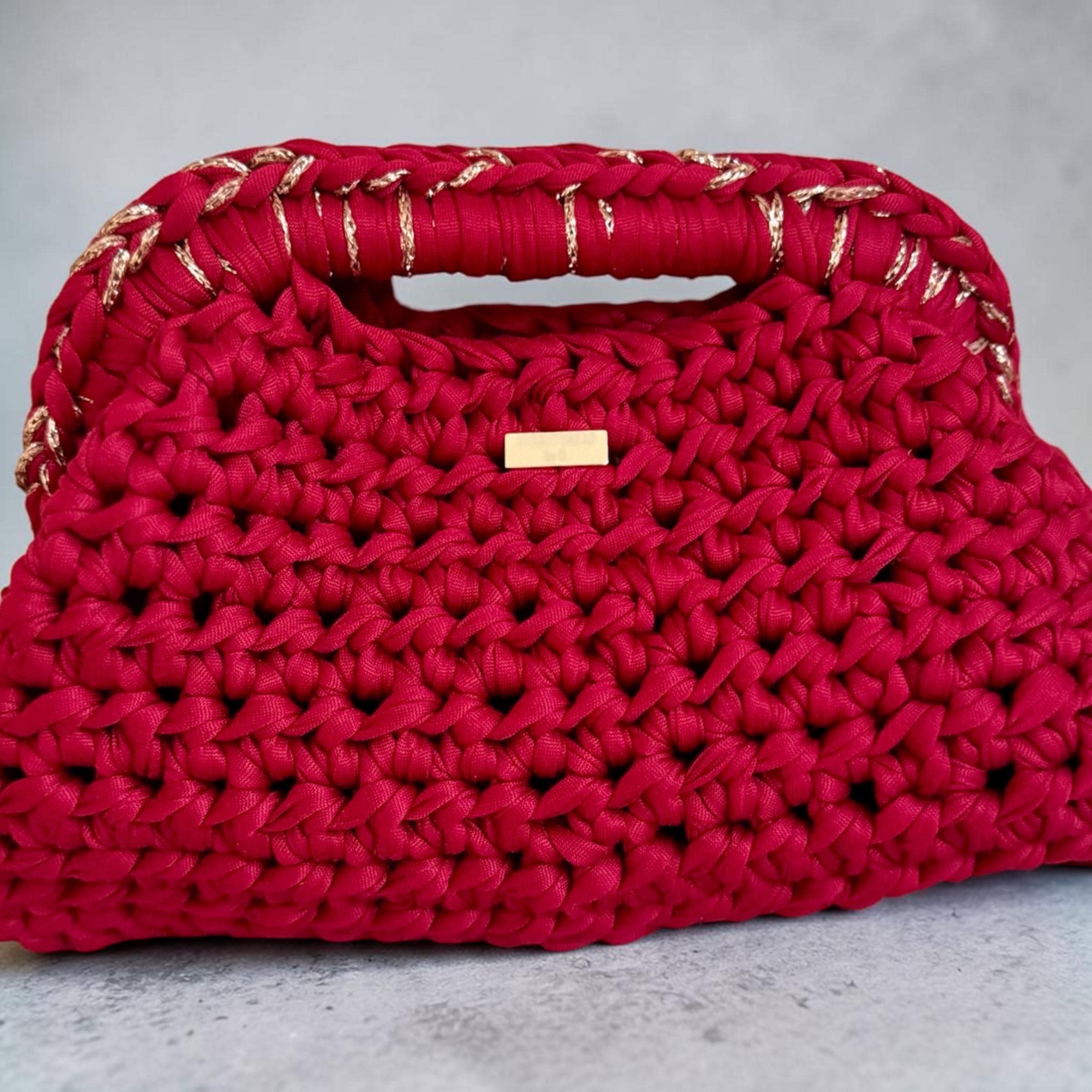 Wine red crochet clutch with fermoir clasp closure